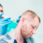 Doctor makes an injection therapy into head nape muscle of male patient.